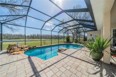 Welcome to your dream home! Nestled on #3 Tee of Cypress Creek on The Golf Club of Cypress Creek in Florida - for sale on GolfHomes.com, golf home, golf lot