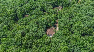 Nestled in the serene gated community of Bent Tree, this home on Bent Tree Golf Course in Georgia - for sale on GolfHomes.com, golf home, golf lot