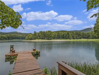 Nestled in the serene gated community of Bent Tree, this home on Bent Tree Golf Course in Georgia - for sale on GolfHomes.com, golf home, golf lot