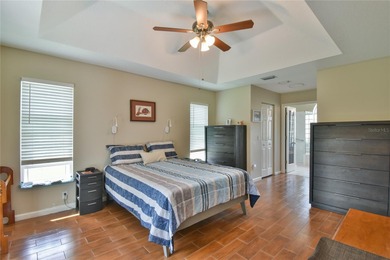LOCATED ON A CUL-DE-SAC, this 2BD/2BA house is on a corner lot on Ocala Palms Golf and Country Club in Florida - for sale on GolfHomes.com, golf home, golf lot