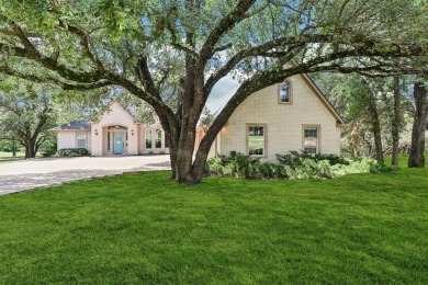 Stop the car this home has it all! Beautiful and spotless clean on Pecan Plantation Country Club in Texas - for sale on GolfHomes.com, golf home, golf lot