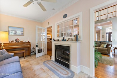 Welcome to this stunning 2,934 sq. ft. custom-built brick home on Carolina National Golf Club in North Carolina - for sale on GolfHomes.com, golf home, golf lot