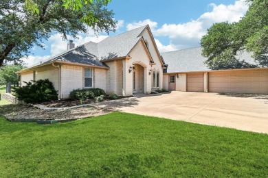 Stop the car this home has it all! Beautiful and spotless clean on Pecan Plantation Country Club in Texas - for sale on GolfHomes.com, golf home, golf lot