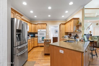 Welcome to this stunning 2,934 sq. ft. custom-built brick home on Carolina National Golf Club in North Carolina - for sale on GolfHomes.com, golf home, golf lot