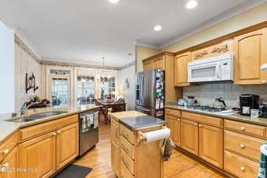 Welcome to this stunning 2,934 sq. ft. custom-built brick home on Carolina National Golf Club in North Carolina - for sale on GolfHomes.com, golf home, golf lot