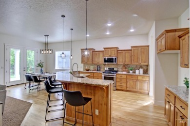 Enjoy a blend of comfort and functionality in this beautiful on Eagle Legacy Golf Course in Idaho - for sale on GolfHomes.com, golf home, golf lot