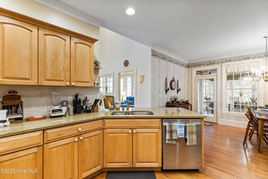 Welcome to this stunning 2,934 sq. ft. custom-built brick home on Carolina National Golf Club in North Carolina - for sale on GolfHomes.com, golf home, golf lot