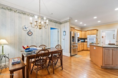 Welcome to this stunning 2,934 sq. ft. custom-built brick home on Carolina National Golf Club in North Carolina - for sale on GolfHomes.com, golf home, golf lot