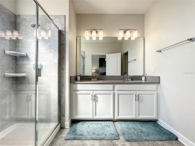 Welcome to this stunning fully furnished 3-bedroom, 2.5-bathroom on ChampionsGate Golf Resort in Florida - for sale on GolfHomes.com, golf home, golf lot