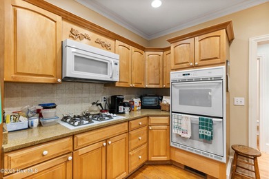 Welcome to this stunning 2,934 sq. ft. custom-built brick home on Carolina National Golf Club in North Carolina - for sale on GolfHomes.com, golf home, golf lot