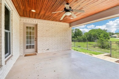 Stop the car this home has it all! Beautiful and spotless clean on Pecan Plantation Country Club in Texas - for sale on GolfHomes.com, golf home, golf lot