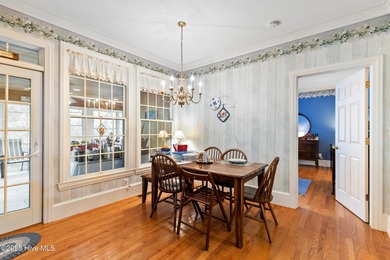 Welcome to this stunning 2,934 sq. ft. custom-built brick home on Carolina National Golf Club in North Carolina - for sale on GolfHomes.com, golf home, golf lot