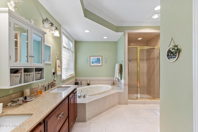 Welcome to this stunning 2,934 sq. ft. custom-built brick home on Carolina National Golf Club in North Carolina - for sale on GolfHomes.com, golf home, golf lot