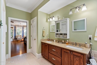 Welcome to this stunning 2,934 sq. ft. custom-built brick home on Carolina National Golf Club in North Carolina - for sale on GolfHomes.com, golf home, golf lot