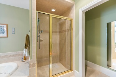 Welcome to this stunning 2,934 sq. ft. custom-built brick home on Carolina National Golf Club in North Carolina - for sale on GolfHomes.com, golf home, golf lot