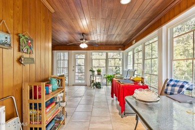 Welcome to this stunning 2,934 sq. ft. custom-built brick home on Carolina National Golf Club in North Carolina - for sale on GolfHomes.com, golf home, golf lot