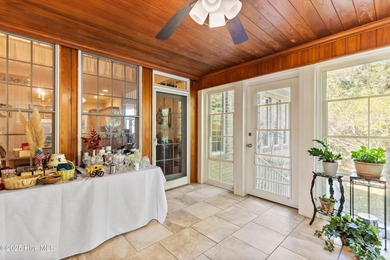 Welcome to this stunning 2,934 sq. ft. custom-built brick home on Carolina National Golf Club in North Carolina - for sale on GolfHomes.com, golf home, golf lot