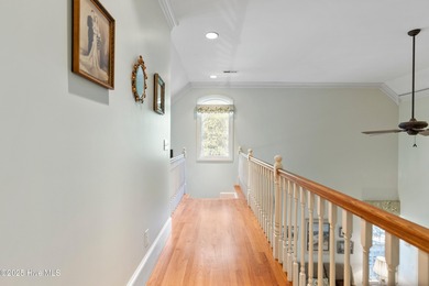 Welcome to this stunning 2,934 sq. ft. custom-built brick home on Carolina National Golf Club in North Carolina - for sale on GolfHomes.com, golf home, golf lot