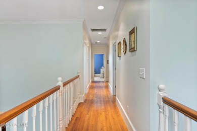 Welcome to this stunning 2,934 sq. ft. custom-built brick home on Carolina National Golf Club in North Carolina - for sale on GolfHomes.com, golf home, golf lot