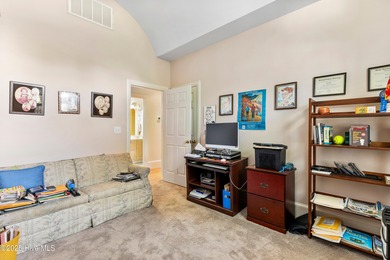 Welcome to this stunning 2,934 sq. ft. custom-built brick home on Carolina National Golf Club in North Carolina - for sale on GolfHomes.com, golf home, golf lot