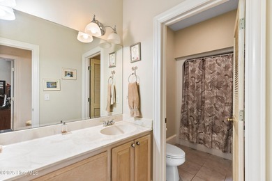 Welcome to this stunning 2,934 sq. ft. custom-built brick home on Carolina National Golf Club in North Carolina - for sale on GolfHomes.com, golf home, golf lot