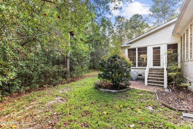 Welcome to this stunning 2,934 sq. ft. custom-built brick home on Carolina National Golf Club in North Carolina - for sale on GolfHomes.com, golf home, golf lot