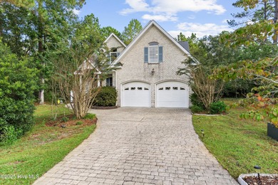 Welcome to this stunning 2,934 sq. ft. custom-built brick home on Carolina National Golf Club in North Carolina - for sale on GolfHomes.com, golf home, golf lot