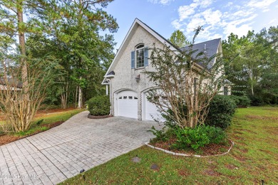 Welcome to this stunning 2,934 sq. ft. custom-built brick home on Carolina National Golf Club in North Carolina - for sale on GolfHomes.com, golf home, golf lot