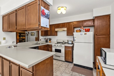 GREAT VALUE IN THIS ONE BEDROOM, 1-st FLOOR, END-UNIT CONDO IN on Fox Run Golf Links in Illinois - for sale on GolfHomes.com, golf home, golf lot
