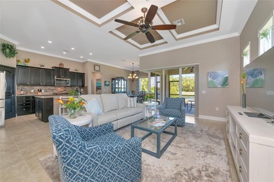 Experience stunning water views from this beautifully updated on Esplanade Golf and Country at Lakewood Ranch in Florida - for sale on GolfHomes.com, golf home, golf lot