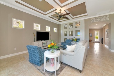 Experience stunning water views from this beautifully updated on Esplanade Golf and Country at Lakewood Ranch in Florida - for sale on GolfHomes.com, golf home, golf lot