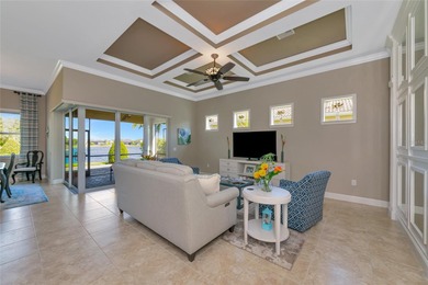 Experience stunning water views from this beautifully updated on Esplanade Golf and Country at Lakewood Ranch in Florida - for sale on GolfHomes.com, golf home, golf lot