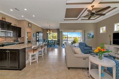 Experience stunning water views from this beautifully updated on Esplanade Golf and Country at Lakewood Ranch in Florida - for sale on GolfHomes.com, golf home, golf lot