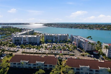 Isla del Sol Penthouse with Sweeping Water Views! Soaring above on Isla Del Sol Yacht and Country Club in Florida - for sale on GolfHomes.com, golf home, golf lot