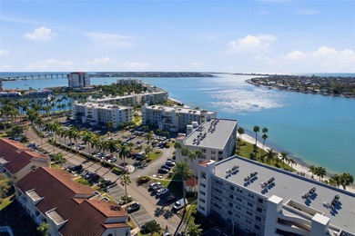 Isla del Sol Penthouse with Sweeping Water Views! Soaring above on Isla Del Sol Yacht and Country Club in Florida - for sale on GolfHomes.com, golf home, golf lot