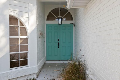 Welcome to 1675 Polo Club Dr, a home that makes it easy to slow on Tarpon Springs Golf Course in Florida - for sale on GolfHomes.com, golf home, golf lot