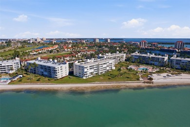 Isla del Sol Penthouse with Sweeping Water Views! Soaring above on Isla Del Sol Yacht and Country Club in Florida - for sale on GolfHomes.com, golf home, golf lot