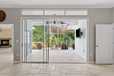 Welcome to 1675 Polo Club Dr, a home that makes it easy to slow on Tarpon Springs Golf Course in Florida - for sale on GolfHomes.com, golf home, golf lot