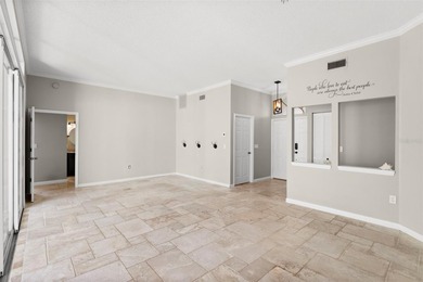 Welcome to 1675 Polo Club Dr, a home that makes it easy to slow on Tarpon Springs Golf Course in Florida - for sale on GolfHomes.com, golf home, golf lot