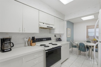 Isla del Sol Penthouse with Sweeping Water Views! Soaring above on Isla Del Sol Yacht and Country Club in Florida - for sale on GolfHomes.com, golf home, golf lot