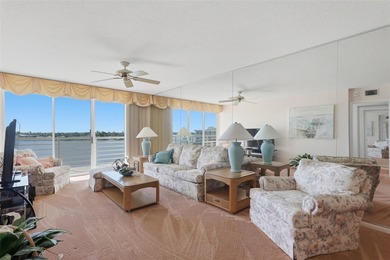 Isla del Sol Penthouse with Sweeping Water Views! Soaring above on Isla Del Sol Yacht and Country Club in Florida - for sale on GolfHomes.com, golf home, golf lot