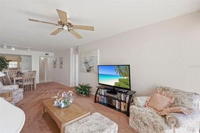 Isla del Sol Penthouse with Sweeping Water Views! Soaring above on Isla Del Sol Yacht and Country Club in Florida - for sale on GolfHomes.com, golf home, golf lot