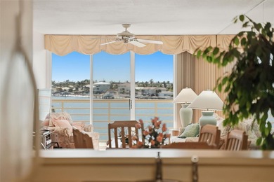 Isla del Sol Penthouse with Sweeping Water Views! Soaring above on Isla Del Sol Yacht and Country Club in Florida - for sale on GolfHomes.com, golf home, golf lot