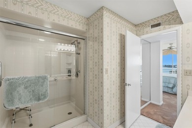 Isla del Sol Penthouse with Sweeping Water Views! Soaring above on Isla Del Sol Yacht and Country Club in Florida - for sale on GolfHomes.com, golf home, golf lot