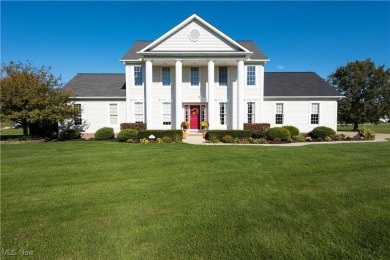 Nestled on a spacious .45-acre property in the prestigious Union on Grey Hawk Golf Club in Ohio - for sale on GolfHomes.com, golf home, golf lot