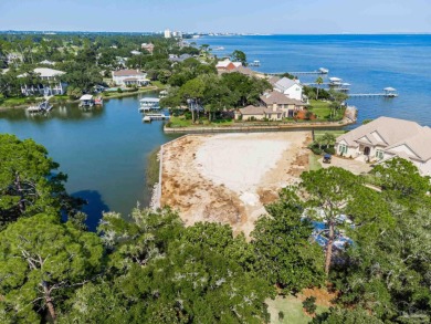 Waterfront Living at Star Lake Discover a rare opportunity to on Pensacola Country Club in Florida - for sale on GolfHomes.com, golf home, golf lot