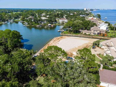 Waterfront Living at Star Lake Discover a rare opportunity to on Pensacola Country Club in Florida - for sale on GolfHomes.com, golf home, golf lot