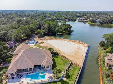Waterfront Living at Star Lake Discover a rare opportunity to on Pensacola Country Club in Florida - for sale on GolfHomes.com, golf home, golf lot