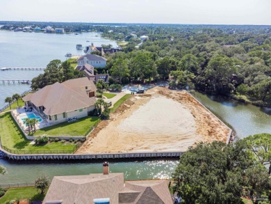 Waterfront Living at Star Lake Discover a rare opportunity to on Pensacola Country Club in Florida - for sale on GolfHomes.com, golf home, golf lot