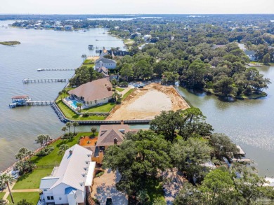 Waterfront Living at Star Lake Discover a rare opportunity to on Pensacola Country Club in Florida - for sale on GolfHomes.com, golf home, golf lot